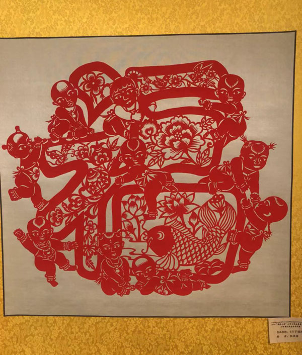 图为张改莲剪纸作品《百子福图》.jpg 图为张改莲剪纸作品《百子福图》.jpg