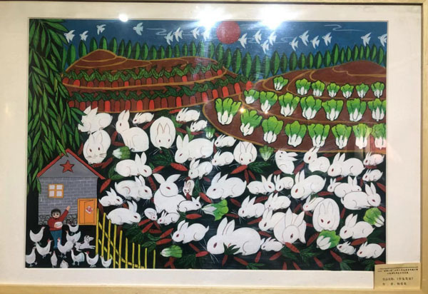 图为杨爱英作品《养兔发家》.jpg 图为杨爱英作品《养兔发家》.jpg